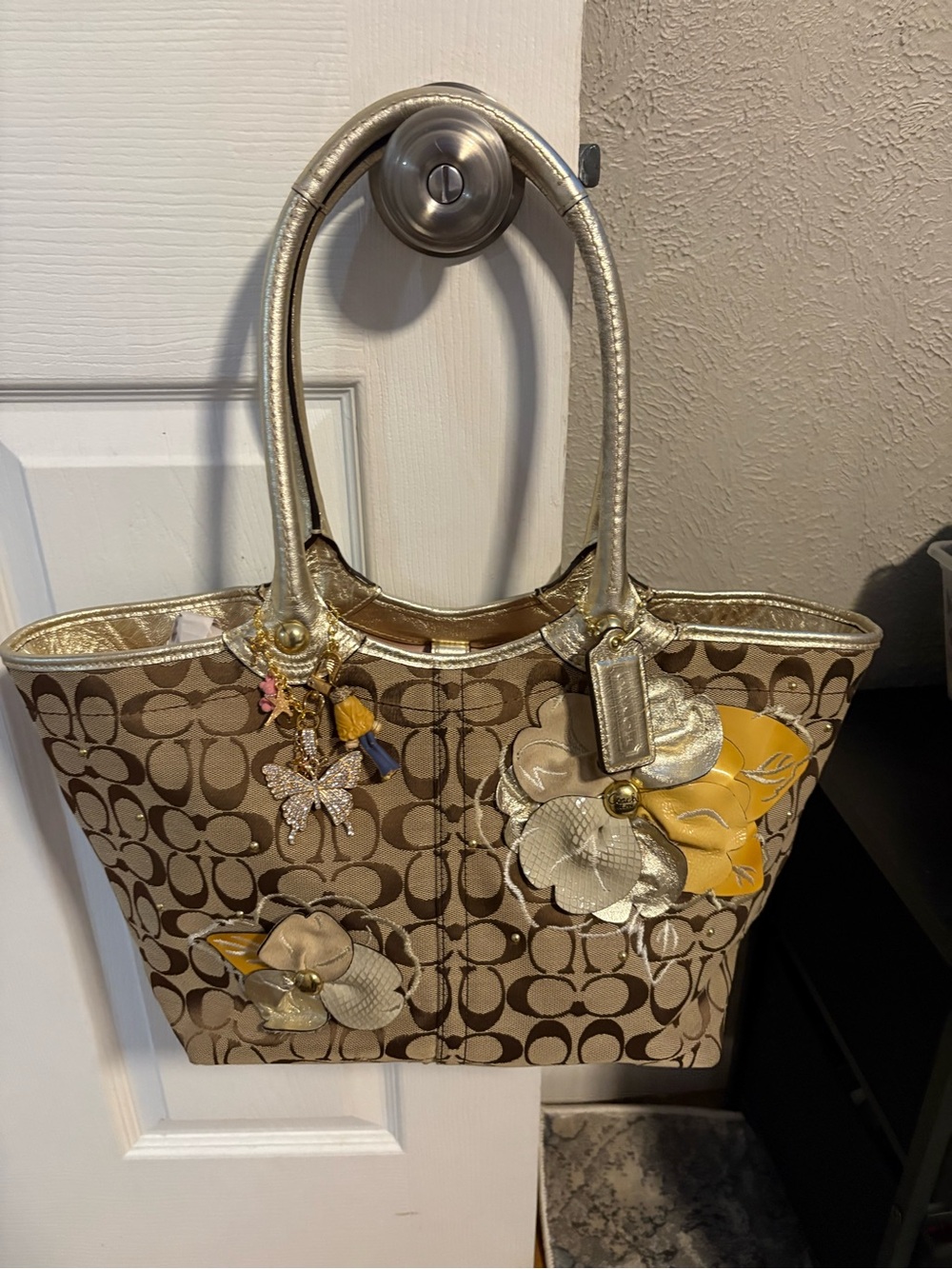 Coach Brown Signature Canvas Tote with Gold Trim and Yellow Floral Accents